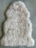 Sheep skin rug, 23