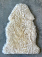 Sheep skin rug, 18
