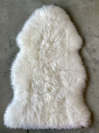 Sheep skin rug, 22