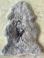 Sheep skin rug, 21
